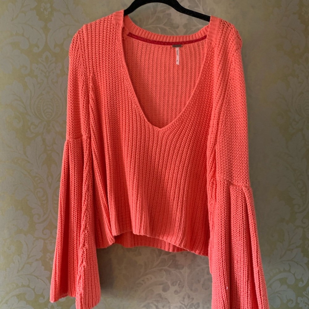 Bright coral sweater from free people